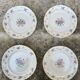 Lot de 4 assiettes à motif floral, liseré doré début xxe