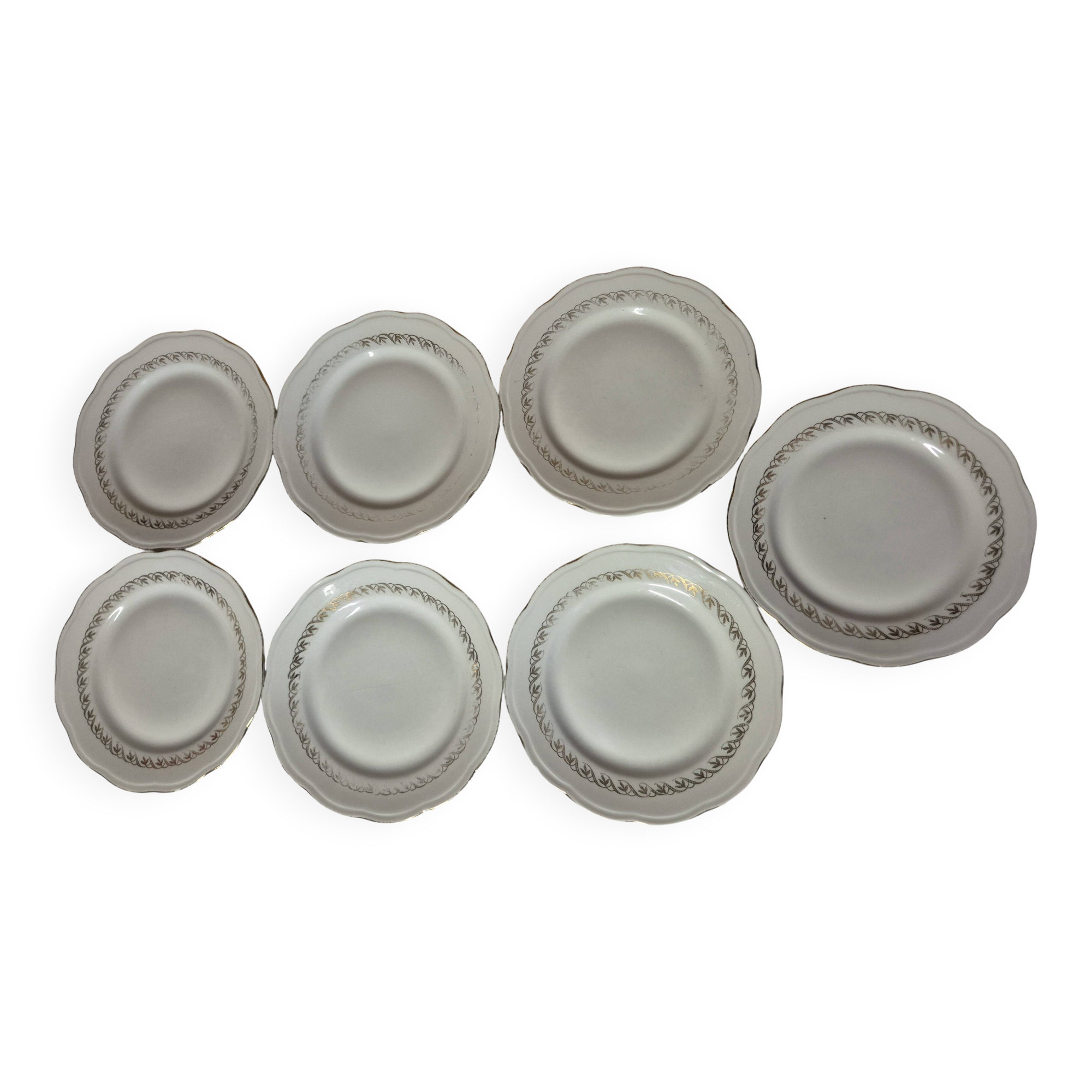 Set of 7 fine porcelain dessert plates with gilding, SFP, French company