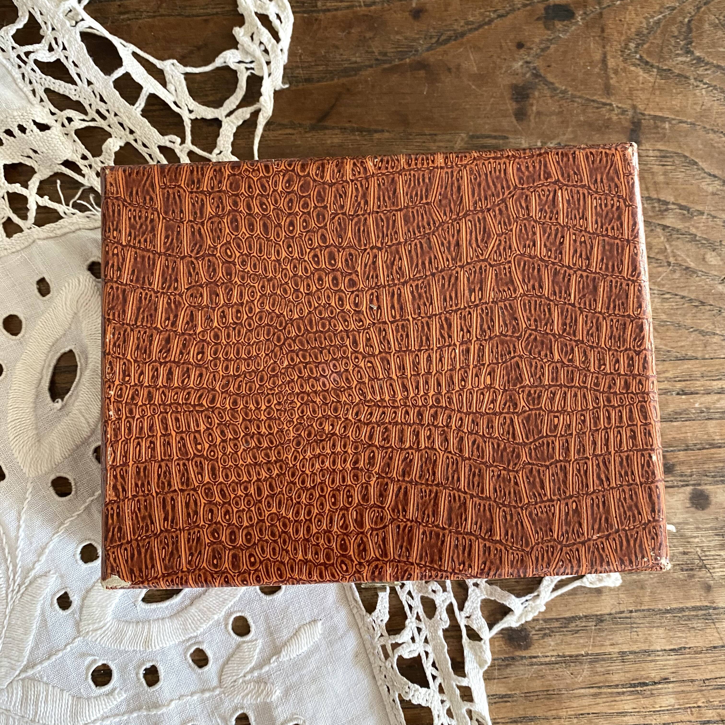 Silver dessert forks in a box