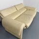Two-seater designer sofa De Sede DS-2011 in cream leather with adjustable backrest.