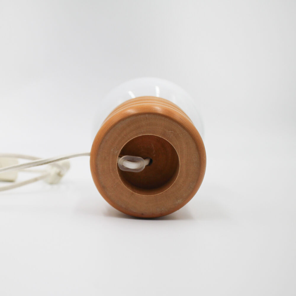 Vintage globe lamp on wooden base