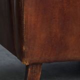 2 fauteuils en cuir de mouton
