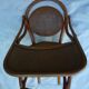 Chaise haute d'enfant cannée modèle début XXème Thonet