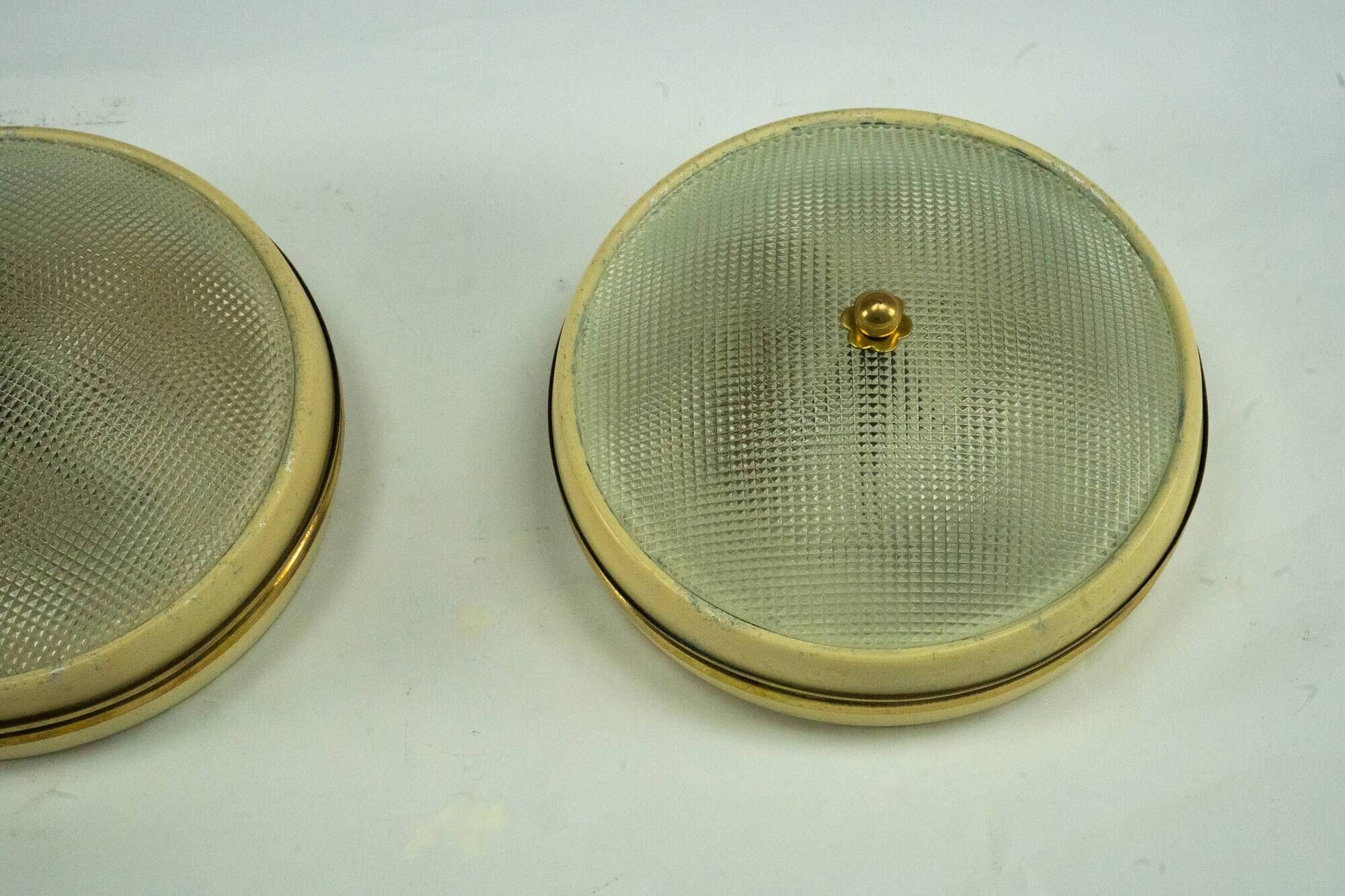 Lumi Milano, pair of wall or ceiling lamps in glass, brass and lacquer, 50s