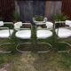 Fauteuils vintage à piétement tubulaire chromé et Skaï blanc de Renato Zevi pour Roche bobois.