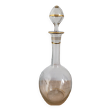Glass carafe with gold trim