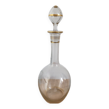 Glass carafe with gold trim