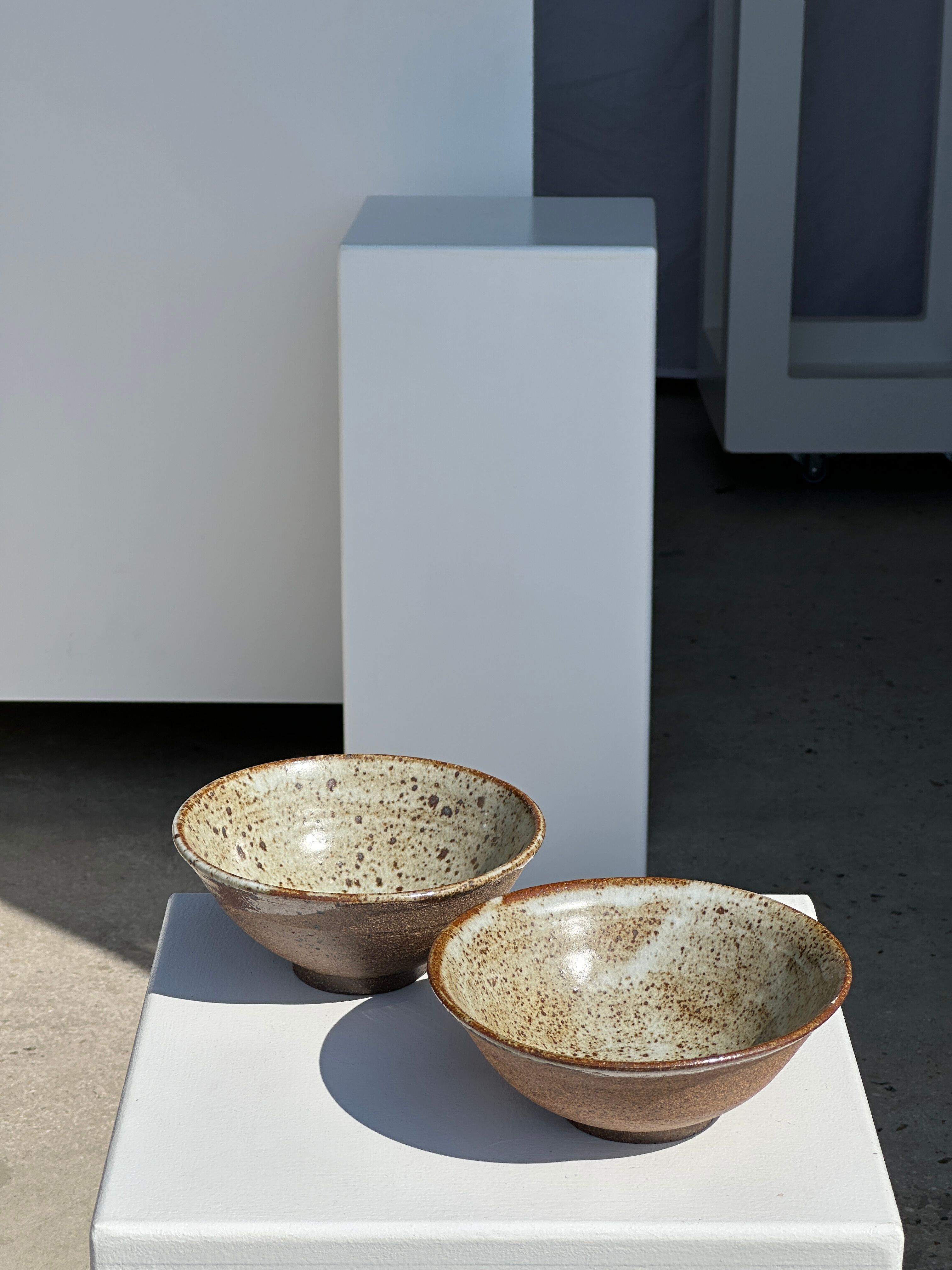 Duo of ceramic bowls interior glazed exterior matt raw earth