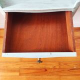 Patinated bedside table end of sofa