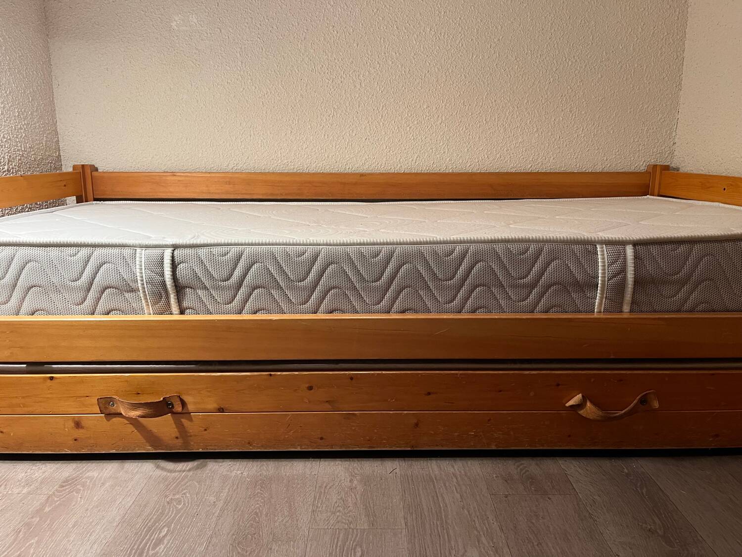 Vintage solid pine trundle bed