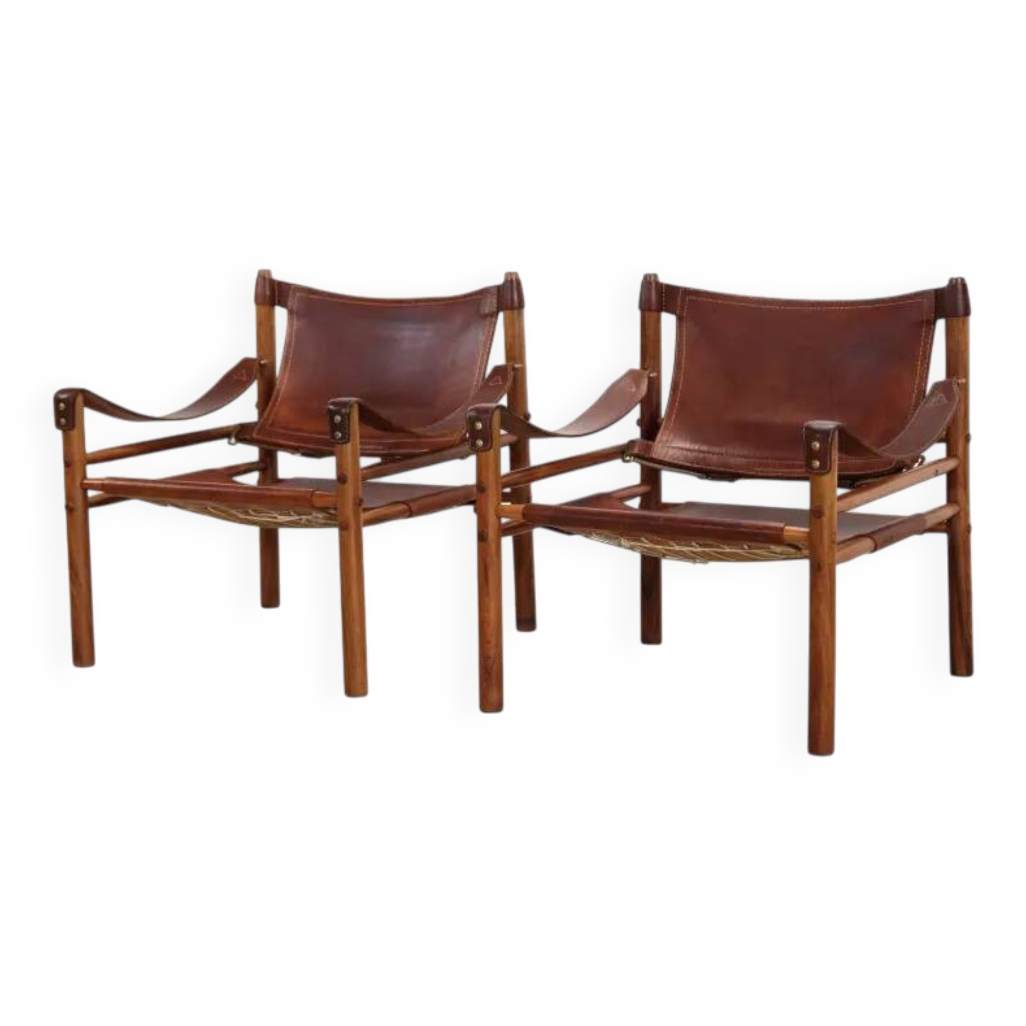 Two Arne Norell Sirocco armchairs in Rosewood and Leather