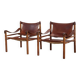Two Arne Norell Sirocco armchairs in Rosewood and Leather