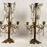 Pair of candlesticks with tassels and flowers in white porcelain