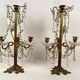 Pair of candlesticks with tassels and flowers in white porcelain