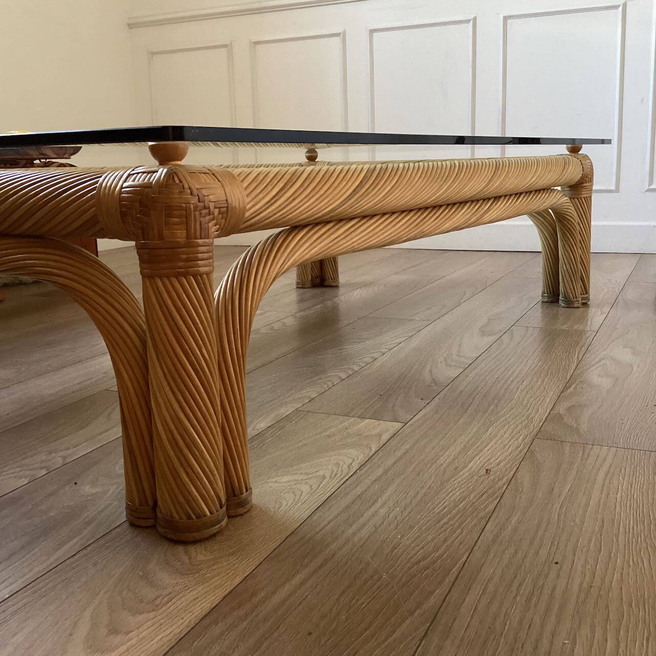 Large rattan and glass coffee table