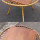"Trampoline" round coffee table in 1960s rattan