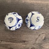 Pair of salt and pepper shakers in porcelain