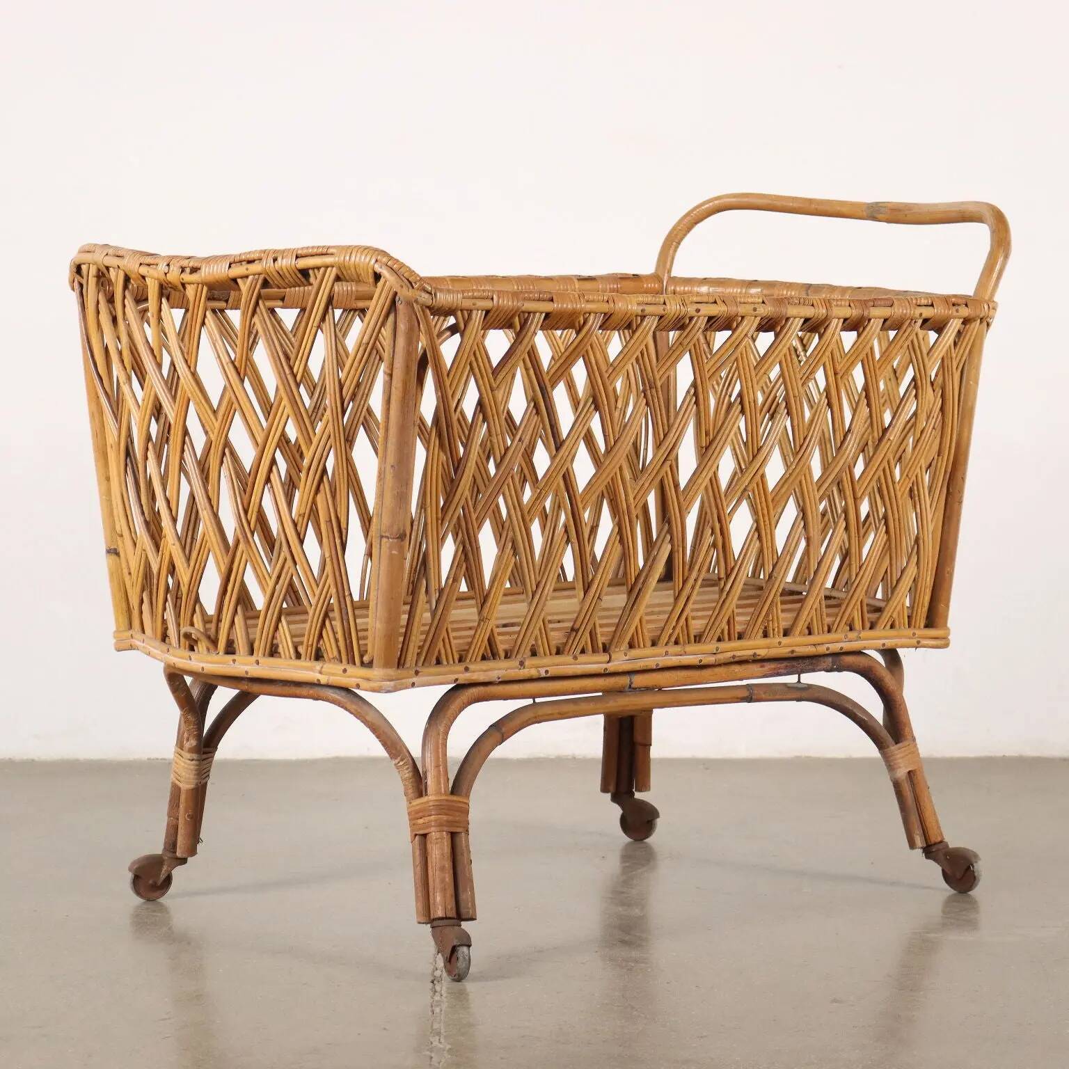 Vintage cradle from the 1960s, bamboo structure.