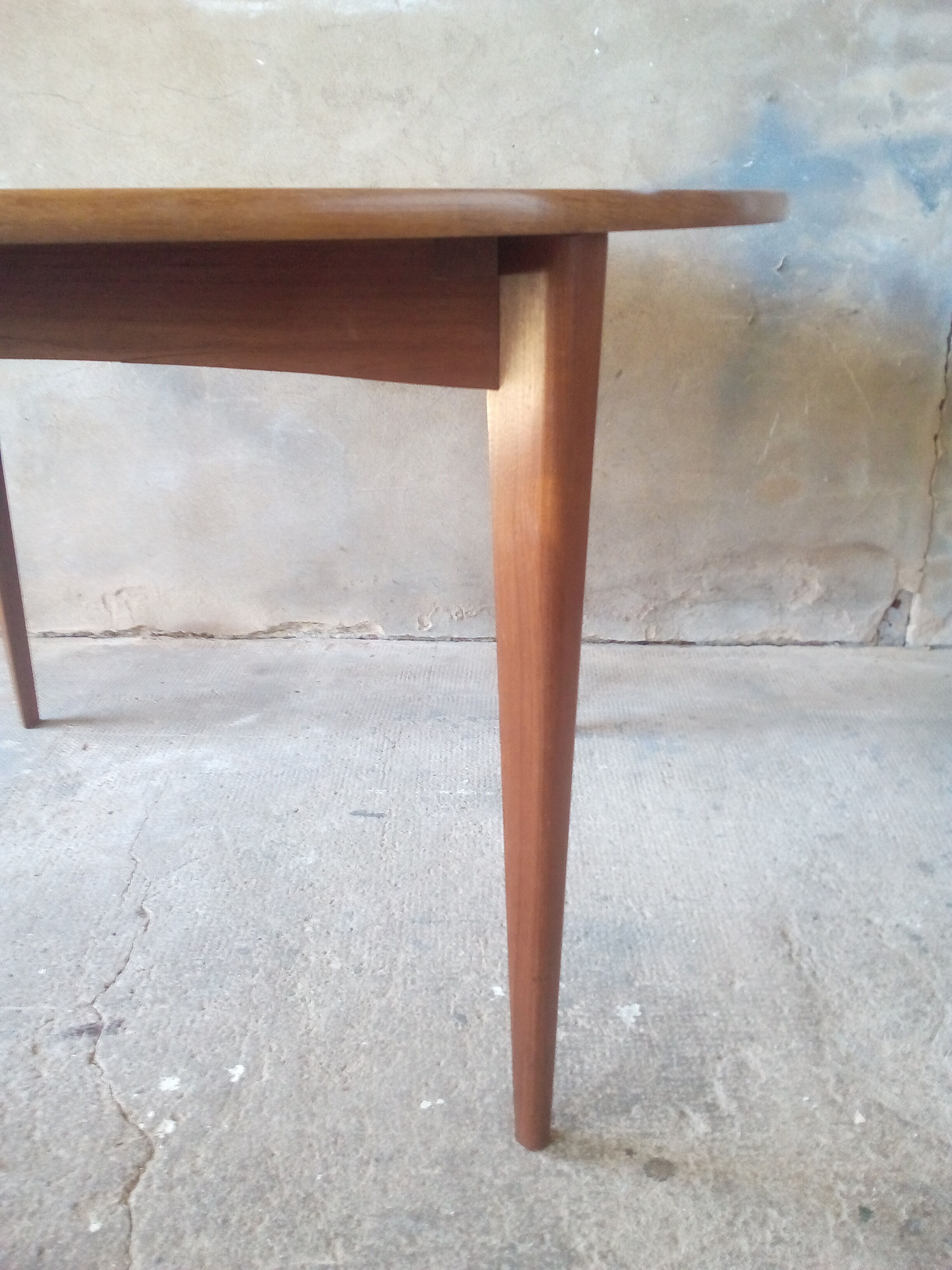 Circular teak table