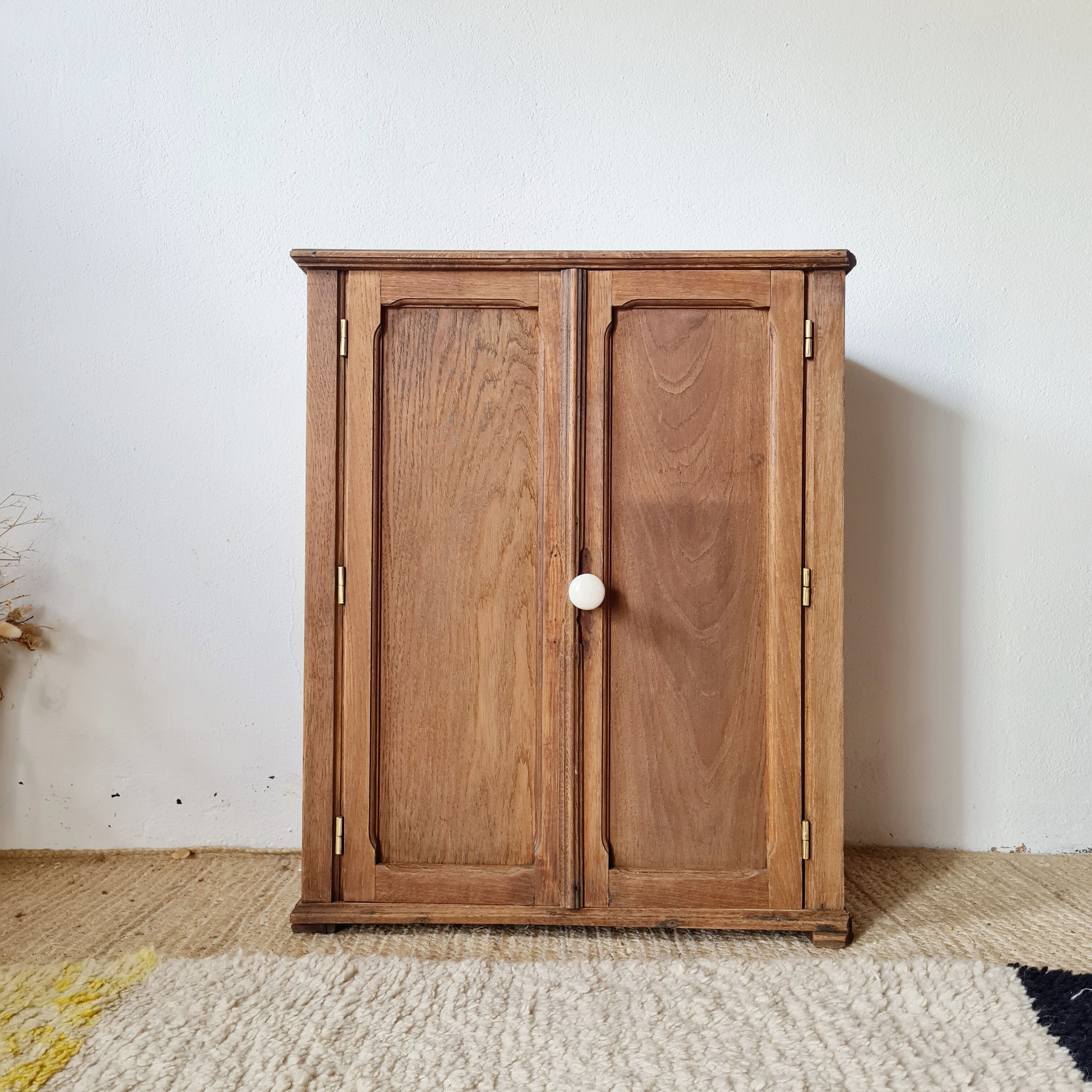 Small Parisian oak wardrobe with its porcelain knob.