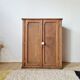 Small Parisian oak wardrobe with its porcelain knob.