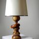 Imposing vintage Scandinavian style lamp designed in turned carved wood with a