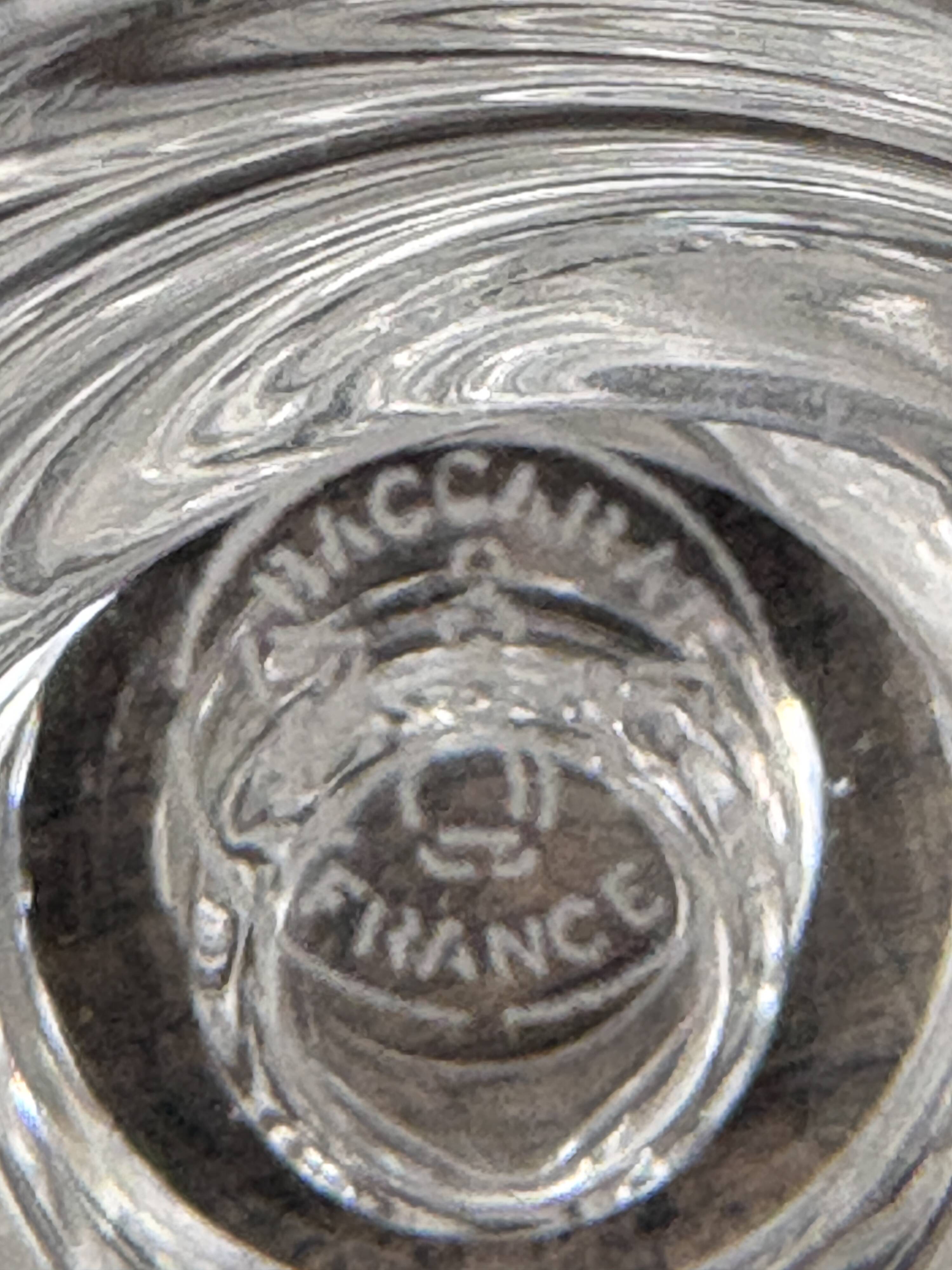 Pair of signed Baccarat Aladin candlesticks