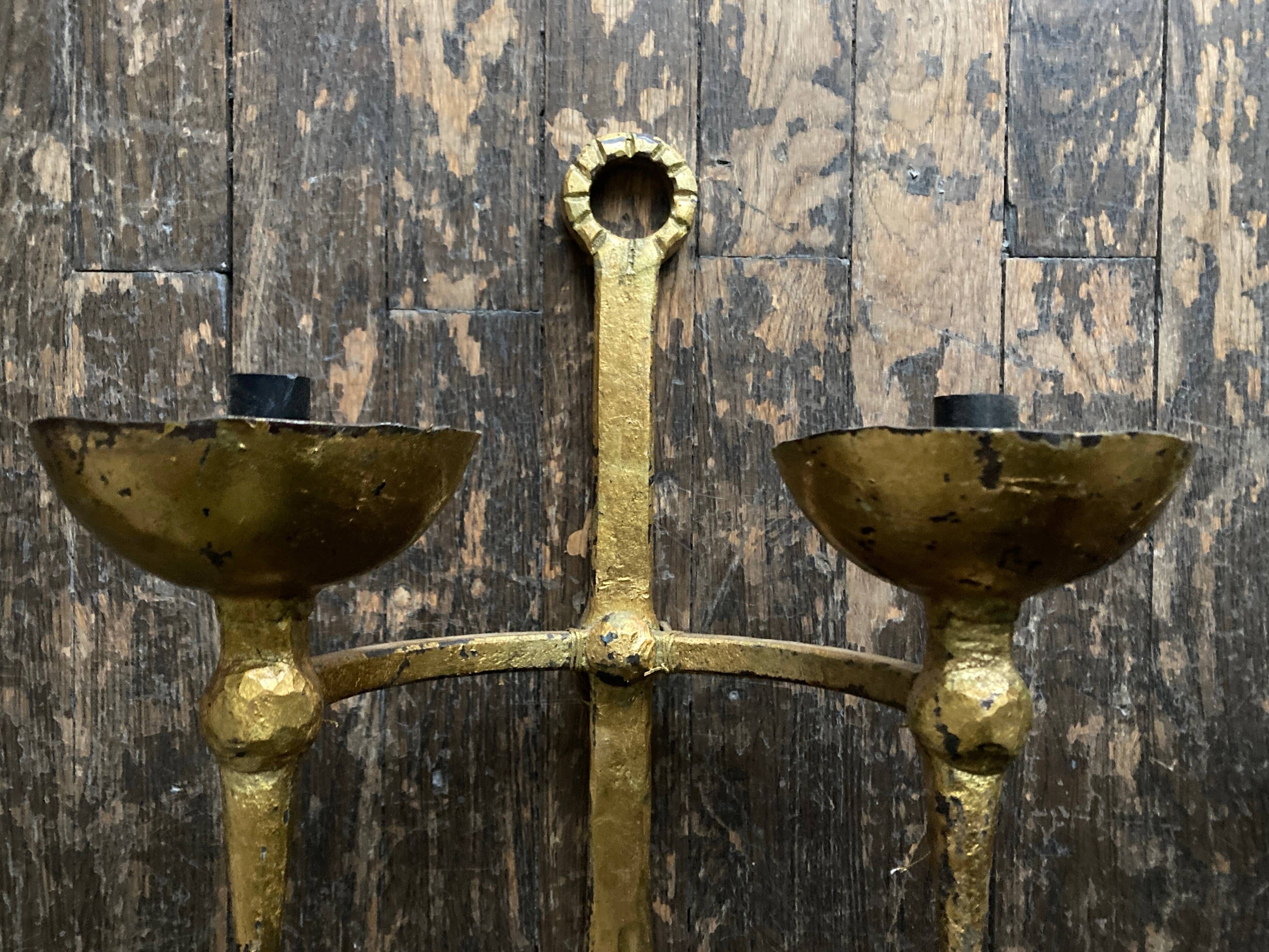 Pair of XXL torchlight sconces in golden beaten iron Italian work 1960