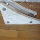 Lampadaire arc Guzzini alu chrome travertin