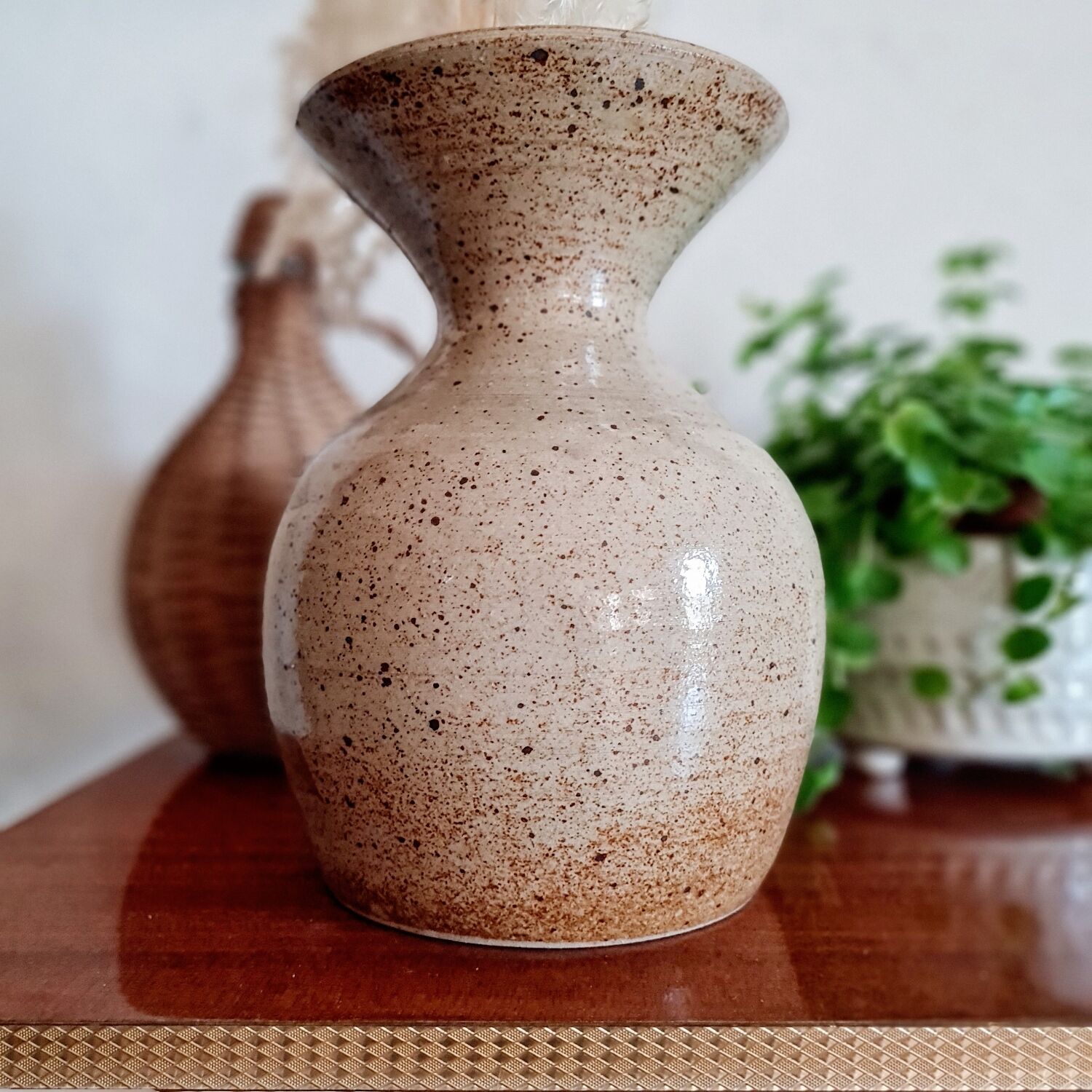 Old sandstone vase painted flowers