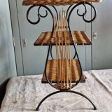Small antique piece of furniture from the 1960s made of rattan and wrought iron in the shape of a lyre.