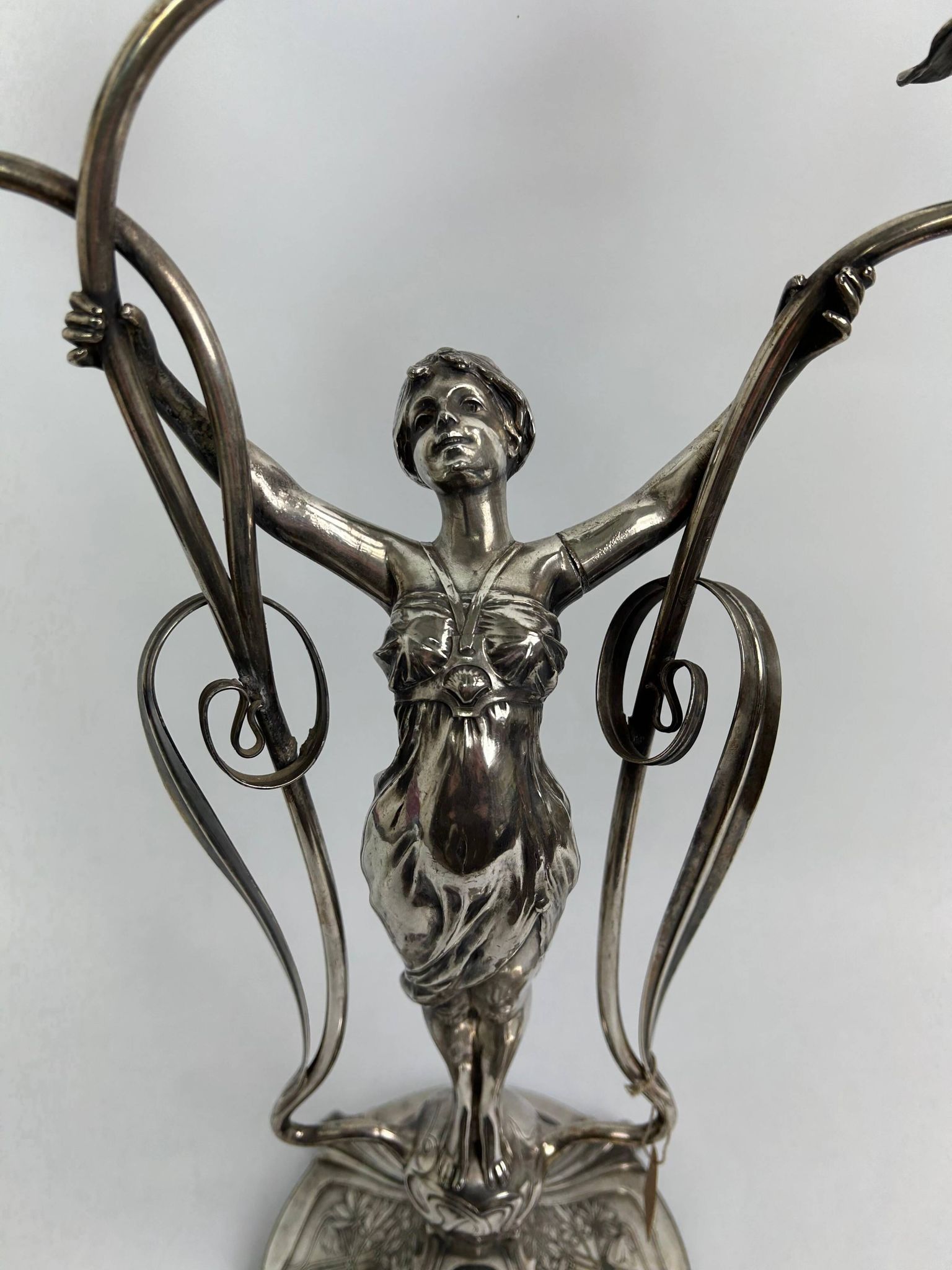 Large figurative chandelier with a femme fatale nymph.