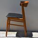 Chaises scandinaves en teck et simili cuir noir 1960