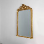 Baroque mantel mirror in carved wood and gilded plaster, France circa 1850.