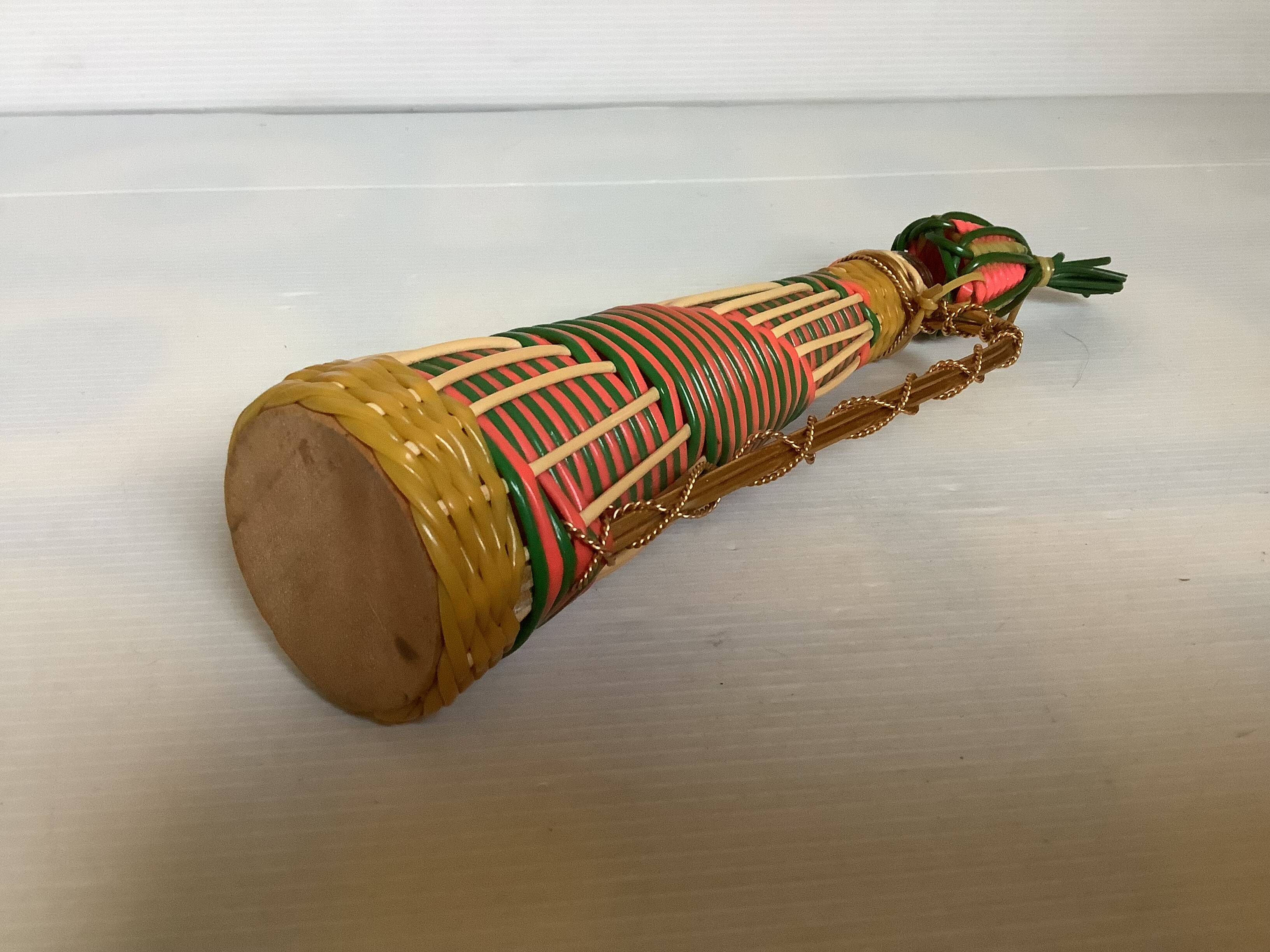 Multicoloured decorative mini bottle with gold metal.