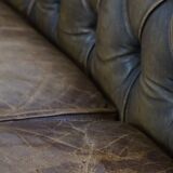 2.5 seater leather chesterfield sofa in a moss green color
