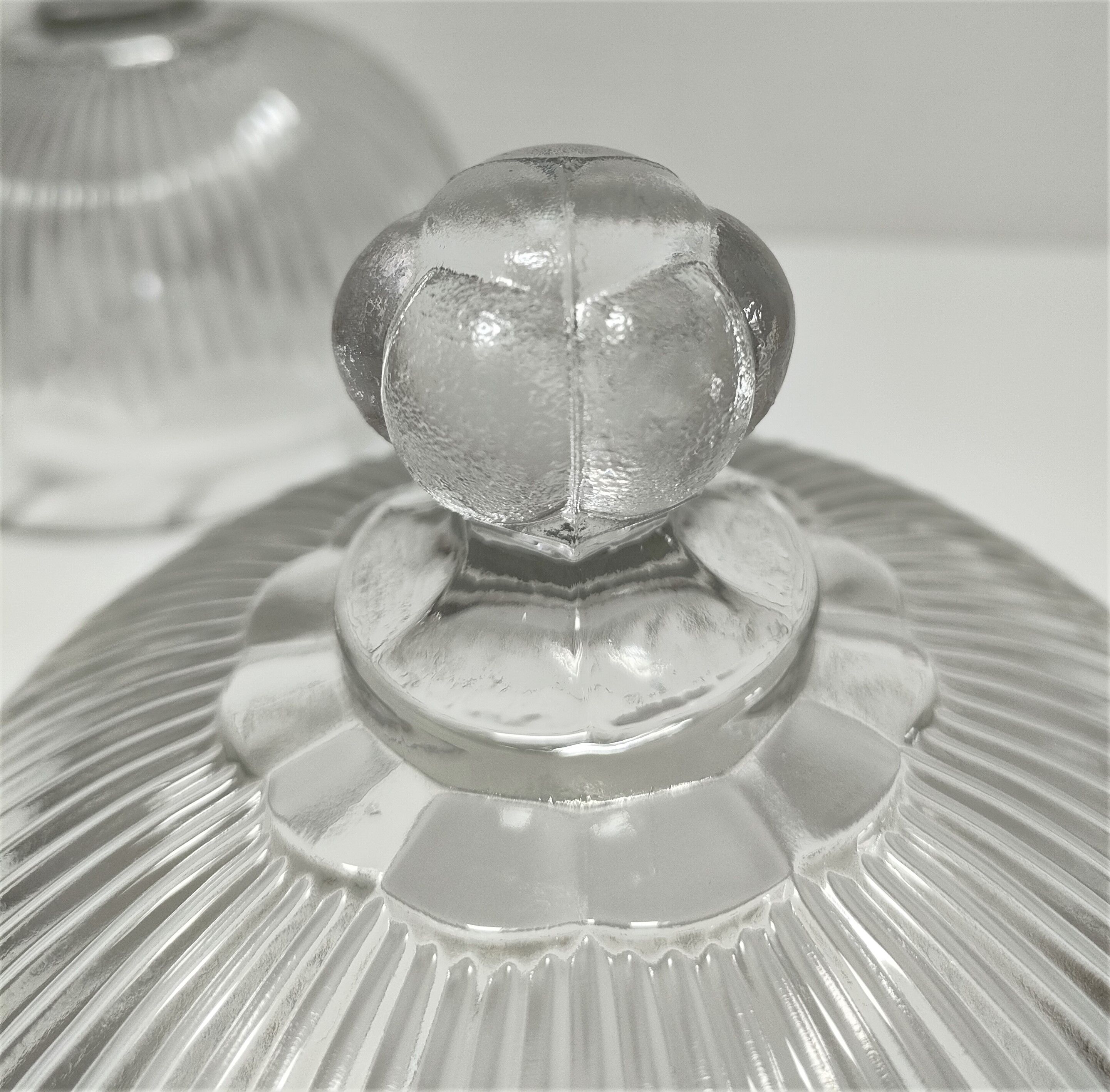 Two cheese bells molded pressed glass striated Art Deco style early twentieth century