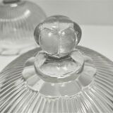Two cheese bells molded pressed glass striated Art Deco style early twentieth century