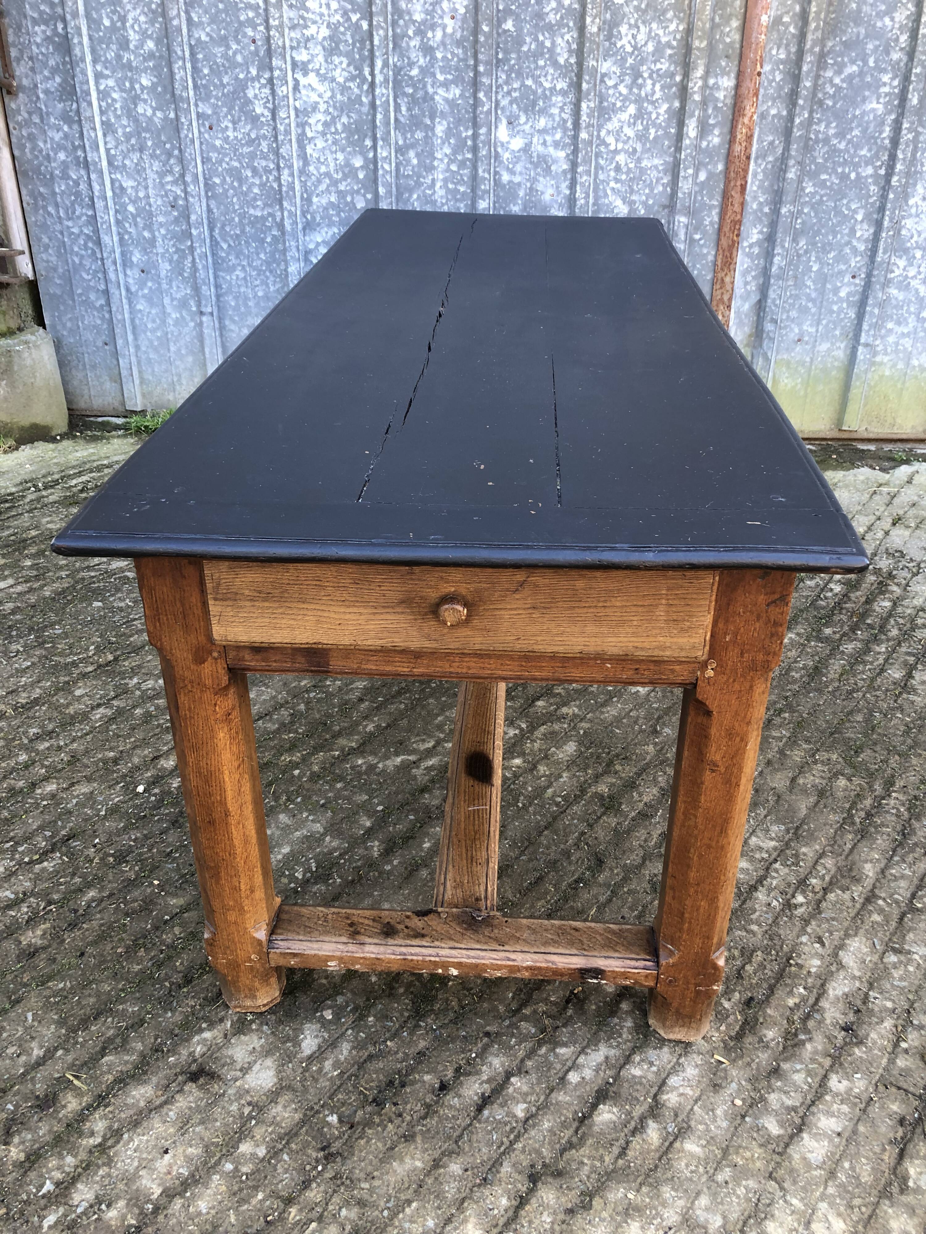 Antique oak farmhouse table with cat bar and 2 end drawers