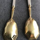 Pair of serving spoons in silver hallmark neck brace