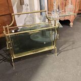 Tinted glass and brass magazine rack