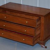 Set of hardwood dressers with finely carved bases.