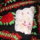 Housse de coussin crochet noir vert et rouge 35X50