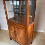 Louis XV style display cabinet, glass doors and chevron panels.