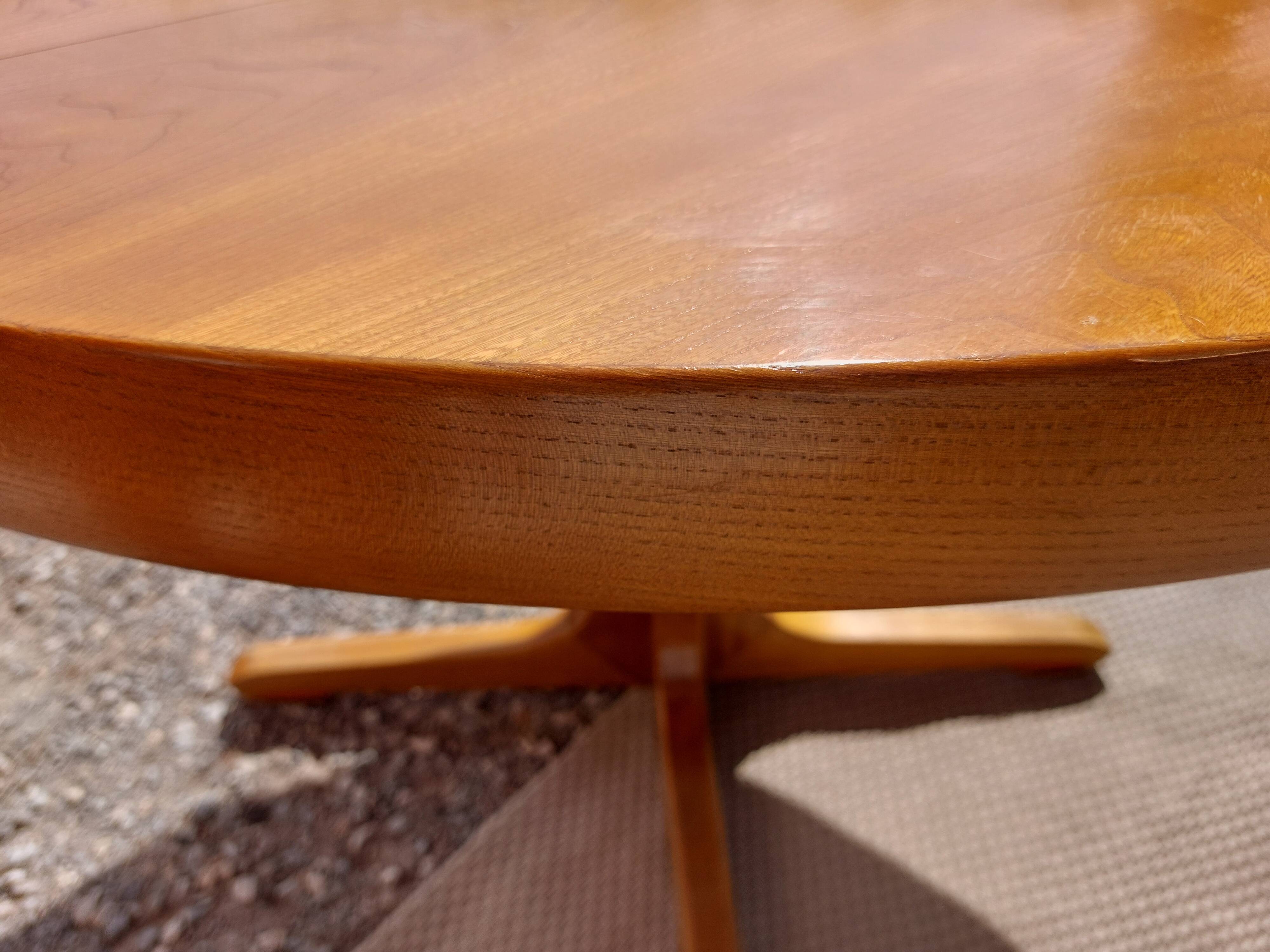 round or oval table with extension, central leg, vintage Baumann design