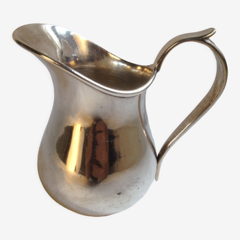 Silver metal milk jug