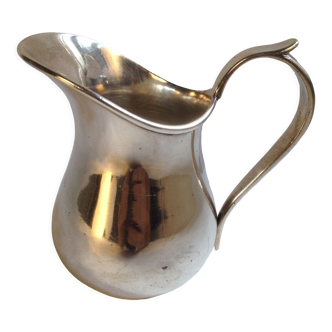 Silver metal milk jug