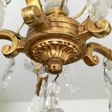Old Louis XV style chandelier in gilded bronze and crystal