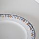 Round dish and flat Terre de Fer, Saint Amandinoise, 1930