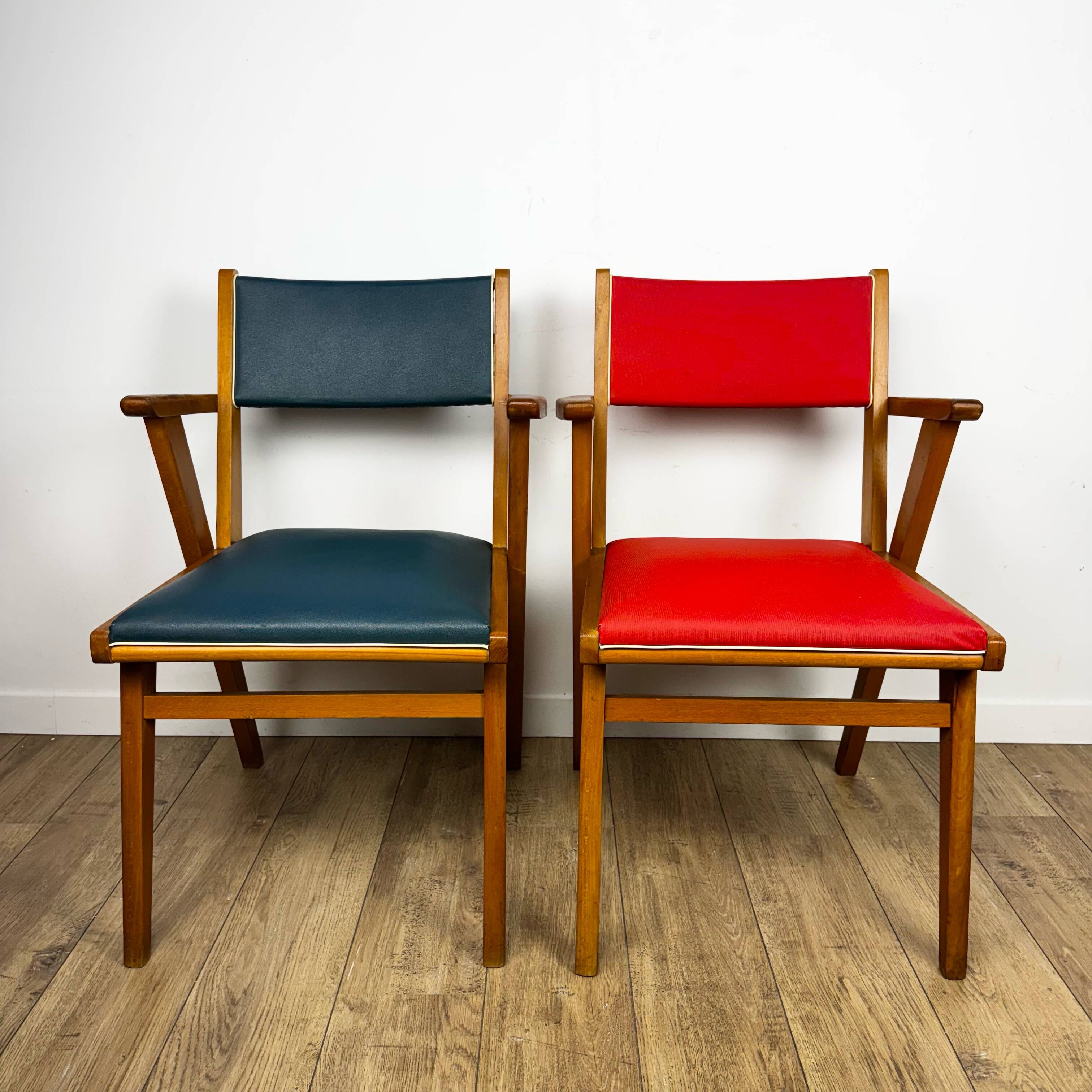 Pair of Scandinavian bridge armchairs in wood and vinyl from the 1950s.